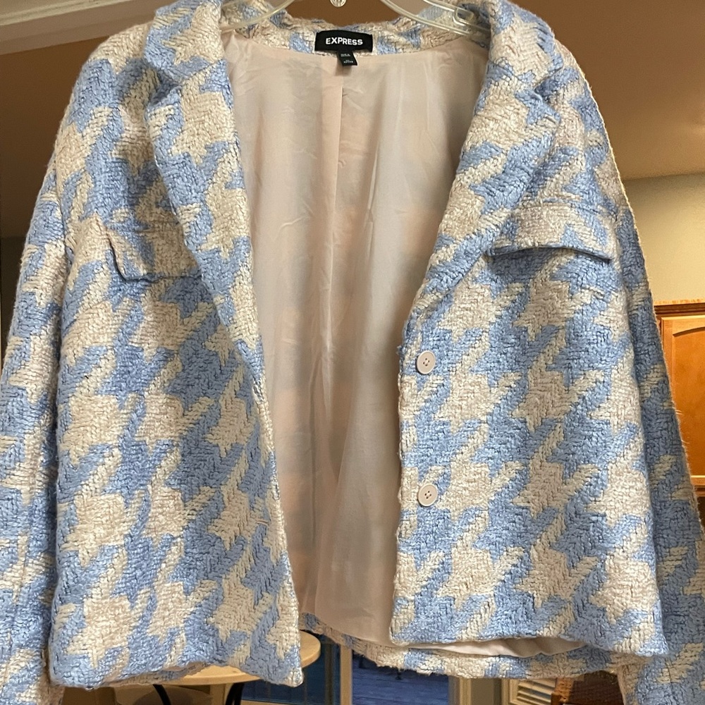 Express periwinkle cropped bouclé jacket.